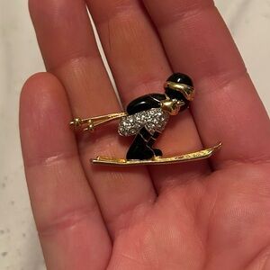 Gold and Black Skier Brooch